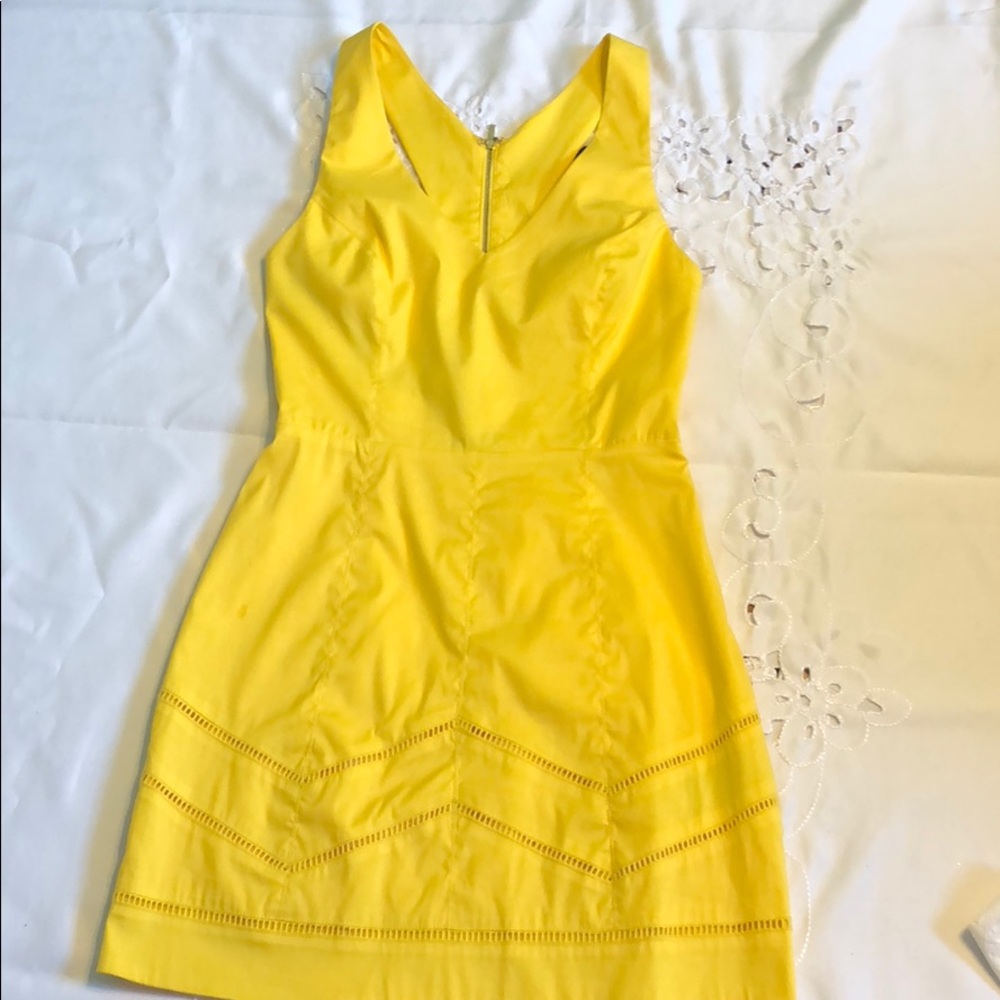 Bebe yellow cutout back dress NWOT